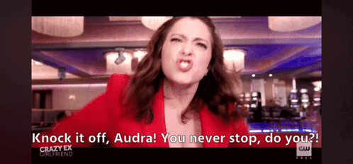 Woman In Red Jacket Says Knock It Off GIF