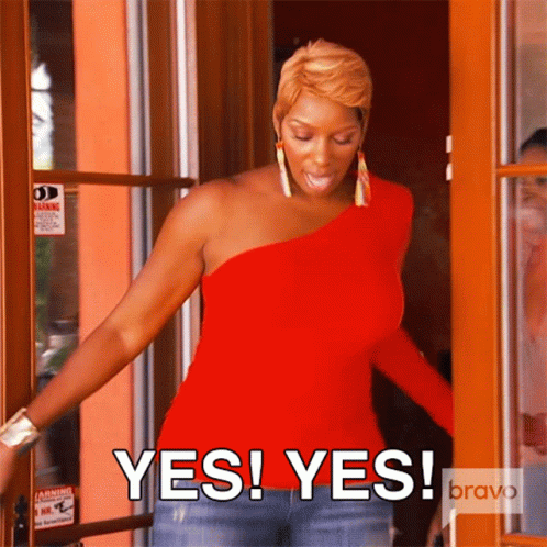 Woman In Red One Shoulder Top Saying Yes GIF