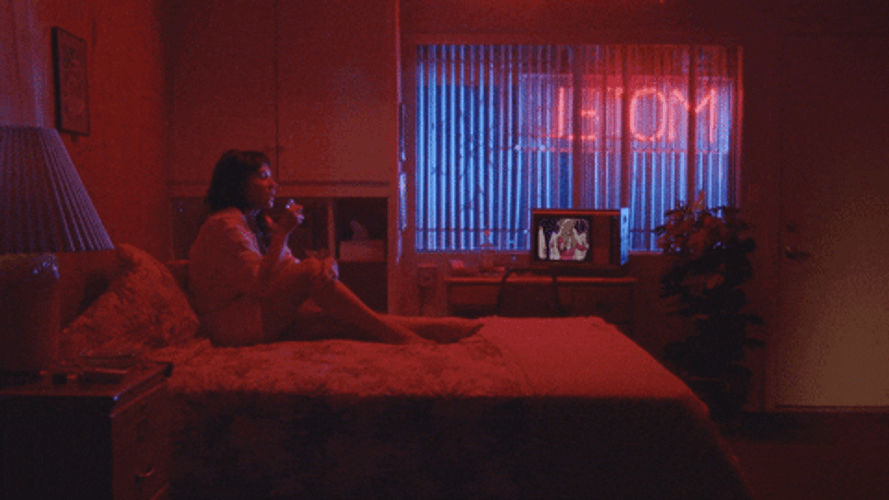 Woman In Red Room GIF