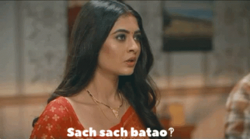 Woman in Red Saree Asking Sach Sach Batao