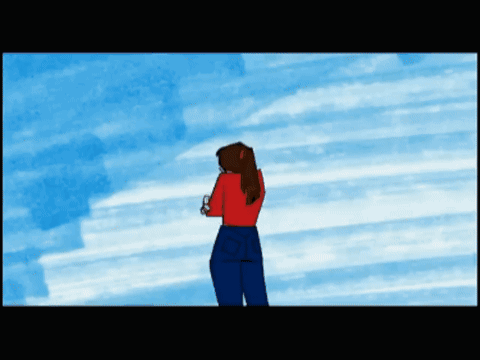 Woman in Red Shirt and Blue Jeans in Front of Blue Background