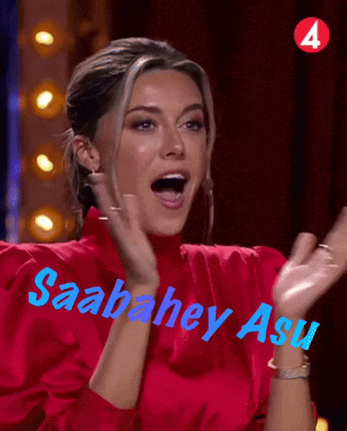 Woman in Red Shirt Applauding Sabahey Asu