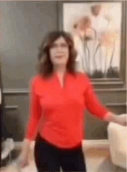 Woman In Red Shirt Dancing GIF