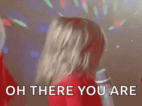 Woman in Red Shirt Dancing Saying Oh There You Are