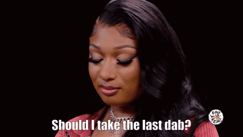 Woman In Red Shirt Holding Hot Sauce Bottle GIF