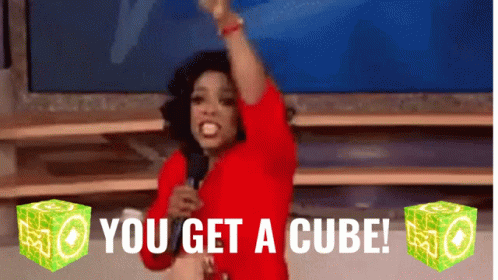 Woman in Red Shirt Holding Microphone Saying You Get a Cube