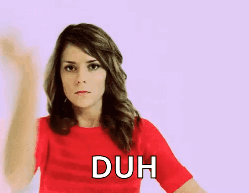Woman in Red Shirt Making Duh Gesture