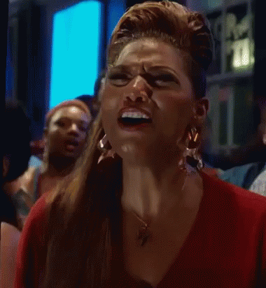 Woman in Red Shirt Making Funny Face