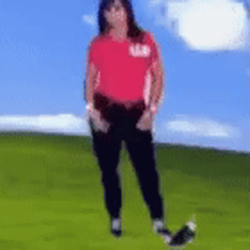 Woman In Red Shirt Number 128 In Field GIF