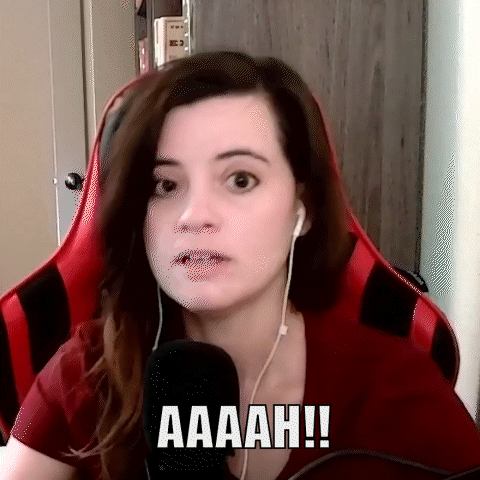 Woman in Red Shirt Saying Aaah at Microphone