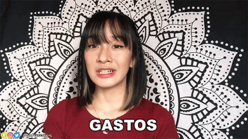 Woman in Red Shirt Saying Gastos
