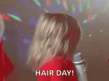 Woman in Red Shirt Saying Hair Day