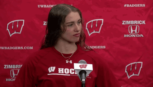 Woman in Red Shirt Saying Hog