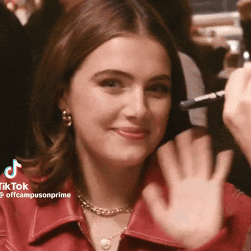 Woman in Red Shirt Waving