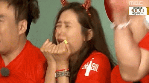 Woman in Red Shirt with Brasil Crying