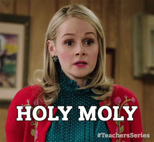 Woman in Red Sweater and Green Shirt Says Holy Moly