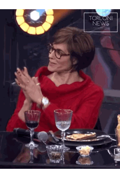 Woman in Red Sweater at Table