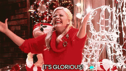 Woman in Red Sweater Saying Glorious