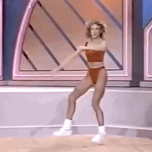Woman In Red Swimsuit Dancing GIF