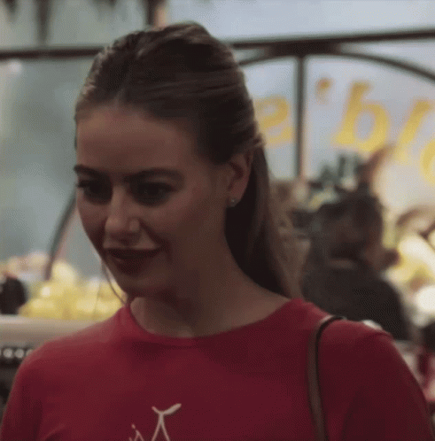 Woman in Red T-Shirt Saying A