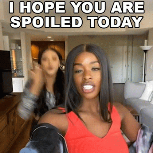 Woman in Red Tank Top Taking Selfie Says I Hope You Are Spoiled Today