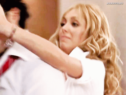 Woman in Red Tie Dancing With Man
