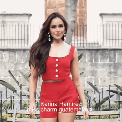 Woman in Red Top and Shorts Saying Karina Ramirez Miss Charm Guatemala