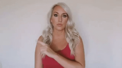 Woman in Red Top Pointing Up All of That
