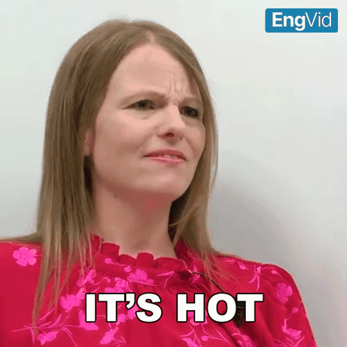 Woman In Red Top Says It's Hot GIF