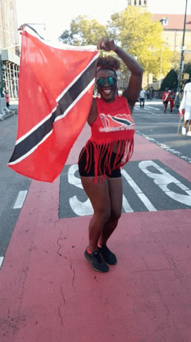 Woman in Red Trinidad Shirt