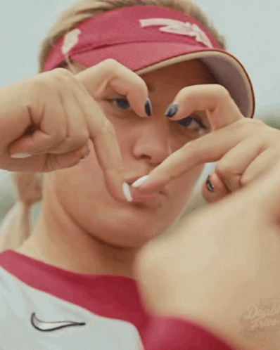 Woman in Red Visor and White Shirt with Double Fries