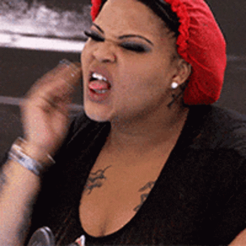 Woman in Red Wig Black Shirt Funny Face