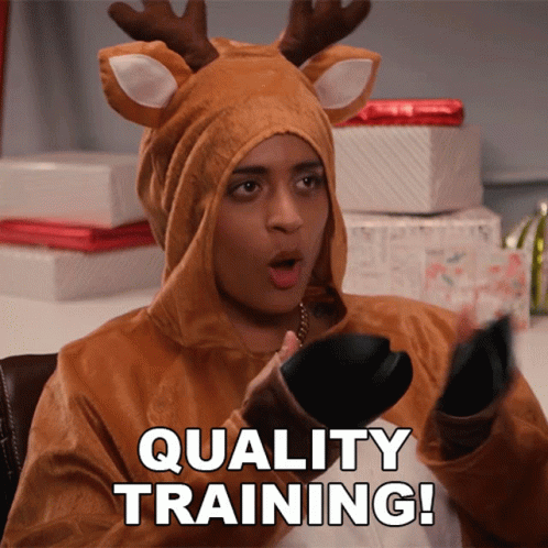 Woman In Reindeer Costume Holding Purse Saying Quality Training GIF