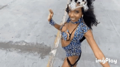 Woman in Revealing Outfit Dancing in Parade