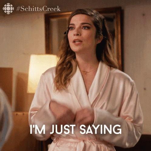 Woman In Robe Saying I'm Just Saying GIF
