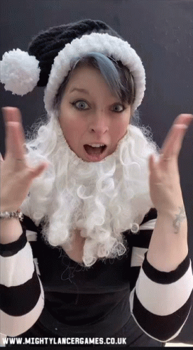 Woman in Santa Hat and Beard with www.mightylancergames.co.uk