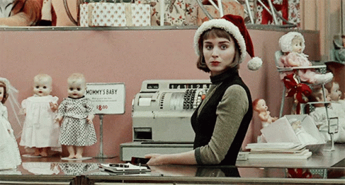 Woman in Santa Hat Behind Mommy's Baby Sign