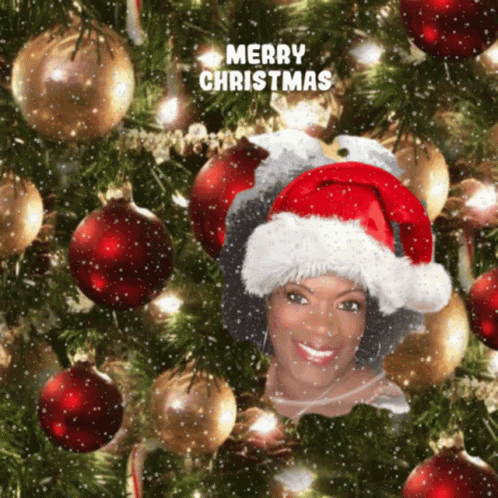 Woman in Santa Hat Saying Merry Christmas