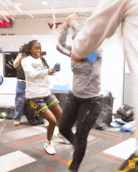 Woman in Saylin Shirt Dancing in Gym