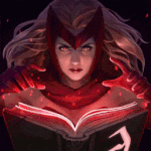Woman in Scarlet Witch Costume Holding Book