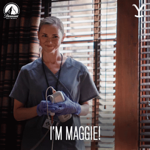 Woman in Scrubs Saying Im Maggie