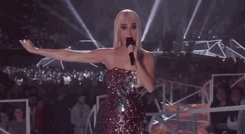 Woman in Sequined Dress Saying Wig Snatched