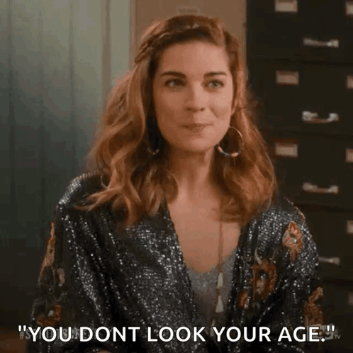 Woman in Sequined Jacket Saying You Don't Look Your Age