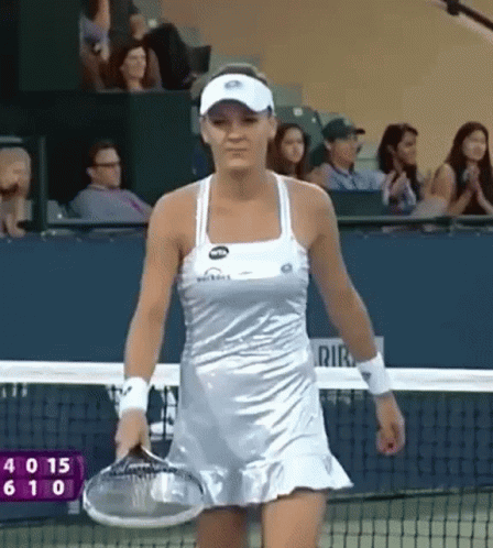 Woman in Silver Dress Holding Tennis Racket