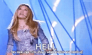 Woman in Silver Dress Says Hell Hey Now