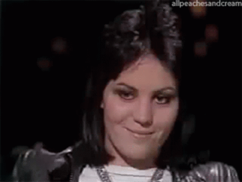 Woman in Silver Jacket Making Funny Face