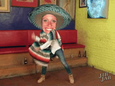 Woman in Sombrero and Poncho Dancing