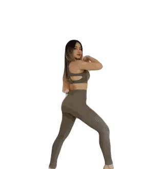 Woman in Sports Bra and Leggings Standing