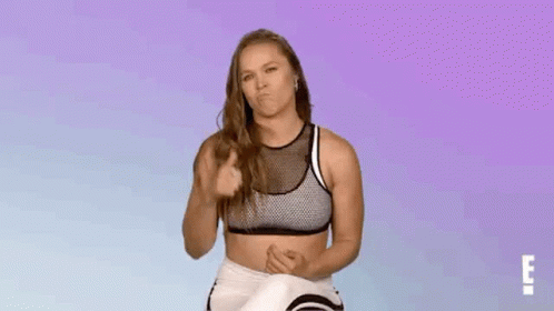 Woman in Sports Bra Giving Thumbs Up
