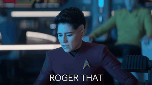 Woman in Star Trek Uniform Saying Roger That